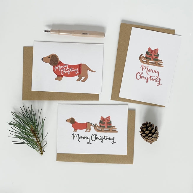 Dachshund Pulling A Sledge Merry Christmas Card Pack of 6