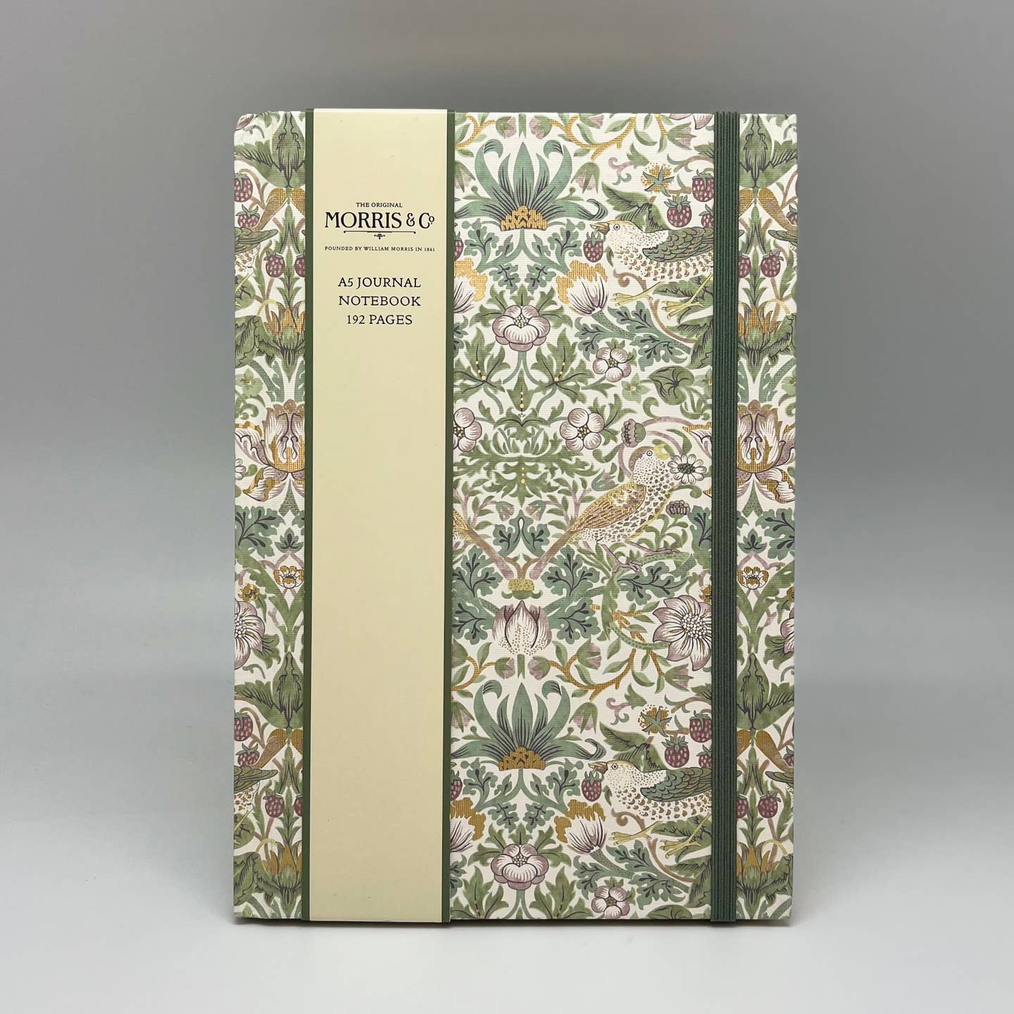 Notebook with floral pattern and Morris & Co branding on a gray background