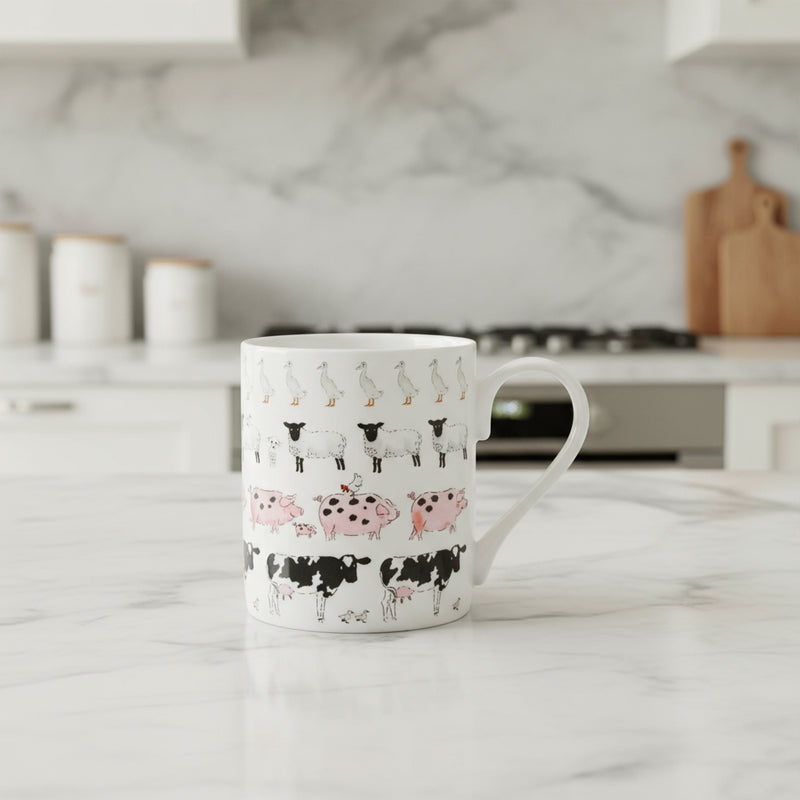 White mug with farm animal pattern on a white background
