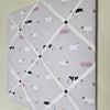 Memo board with farm animal pattern on a light gray background