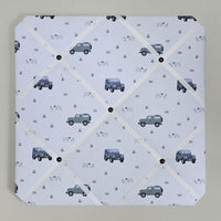 Memo board with vehicle pattern on a light gray background