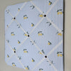 Memo board with lemon pattern on a light blue background