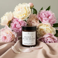 Candle Jar with a label on a neutral background