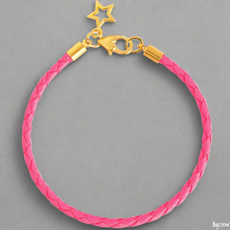 Pink braided bracelet with gold clasp and star charm on a white background