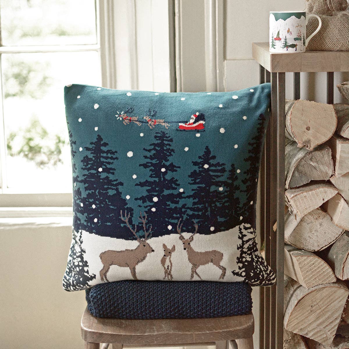Home For Christmas Knitted Cushion by Sophie Allport