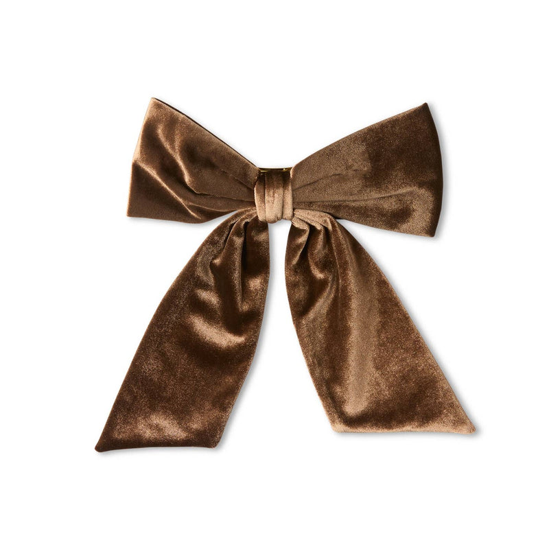 Brown velvet bow on a white background