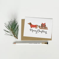 Dachshund Pulling A Sledge Merry Christmas Card Pack of 6