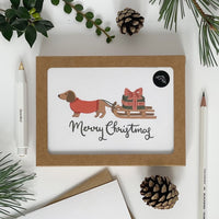Dachshund Pulling A Sledge Merry Christmas Card Pack of 6