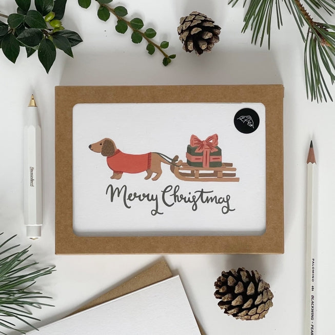 Dachshund Pulling A Sledge Merry Christmas Card Pack of 6