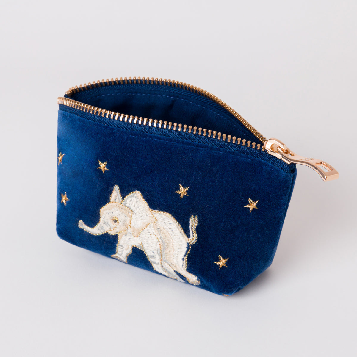 Purses with elephants online on them